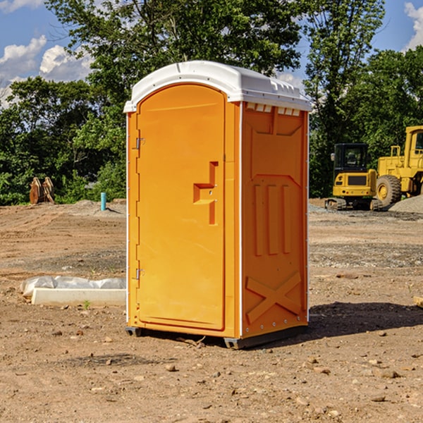 how often are the portable restrooms cleaned and serviced during a rental period in North Hampton